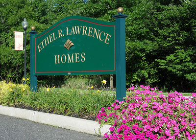 The Ethel R. Lawrence Homes entrance sign is located along the community entrance.