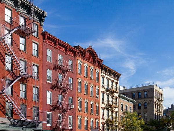 Photo of apartment buildings in Manhattan, New York. Photo of apartment buildings in Manhattan, New York.