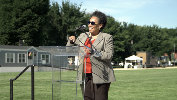 Photo of Secretary Fudge standing in front of a microphone and podium during the opening ceremony on the National Mall. Photo of Secretary Fudge standing in front of a microphone and podium during the opening ceremony on the National Mall.