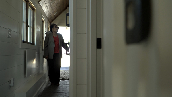 Photo of Secretary Fudge inside of Timbercraft's Tiny home. Photo of Secretary Fudge inside of Timbercraft's Tiny home.